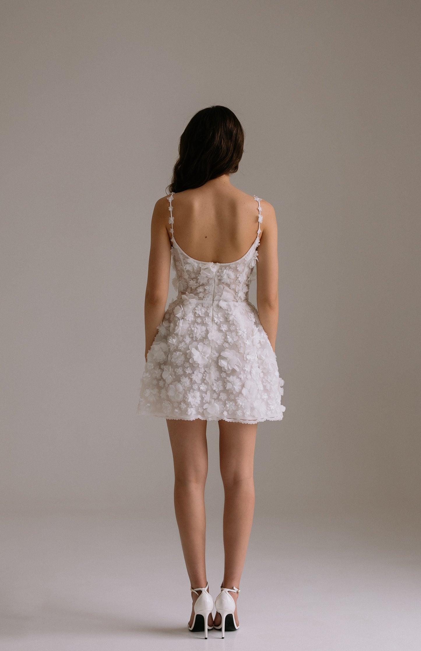 Flora short wedding dress back view showcasing sophisticated silhouette. Perfect as engagement dress, after party wedding dress or bridal shower dress.
