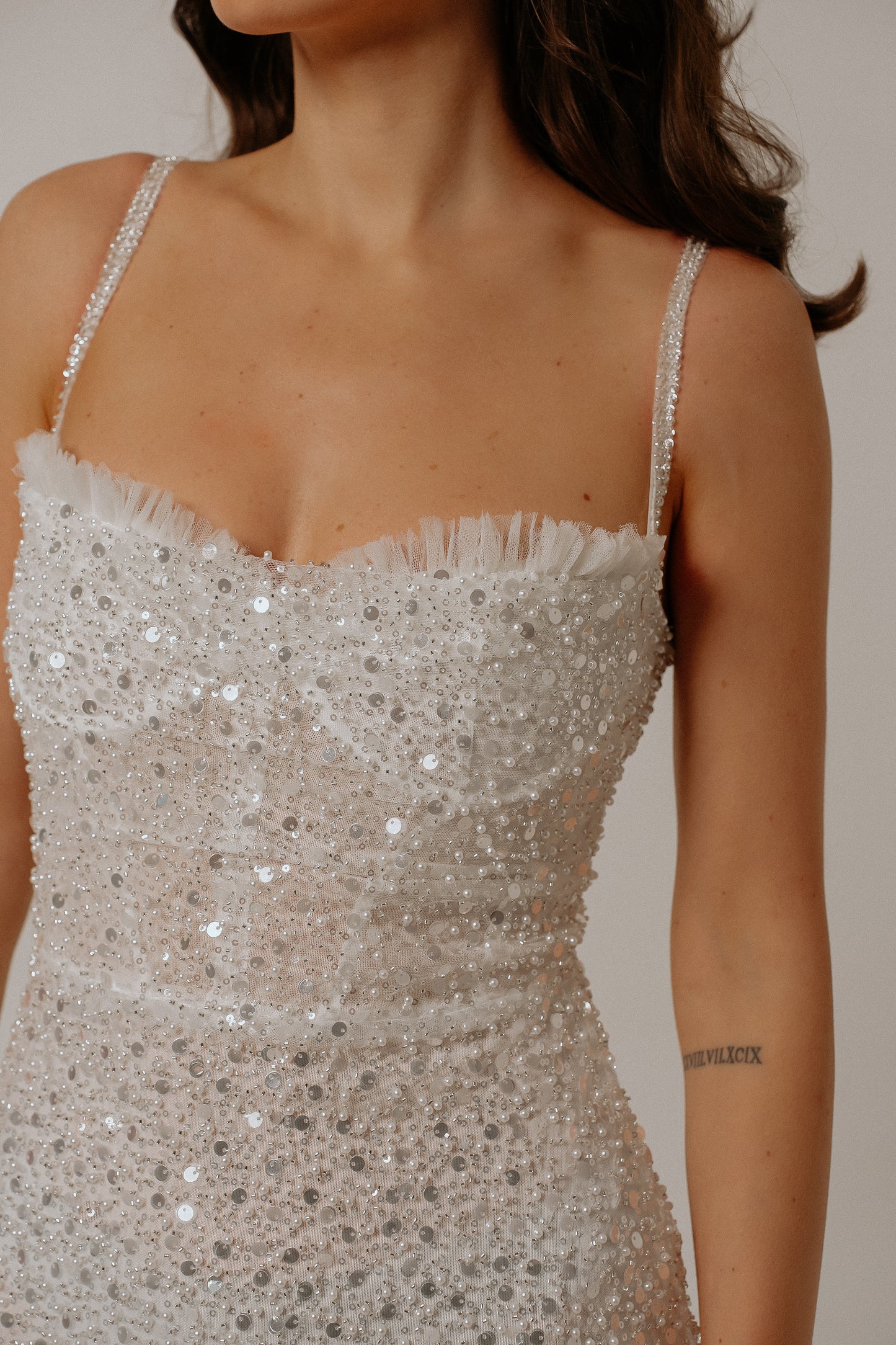Celia white dress detail view showing fabric and bodice details. Perfect as bridal shower dress or, wedding party dress.