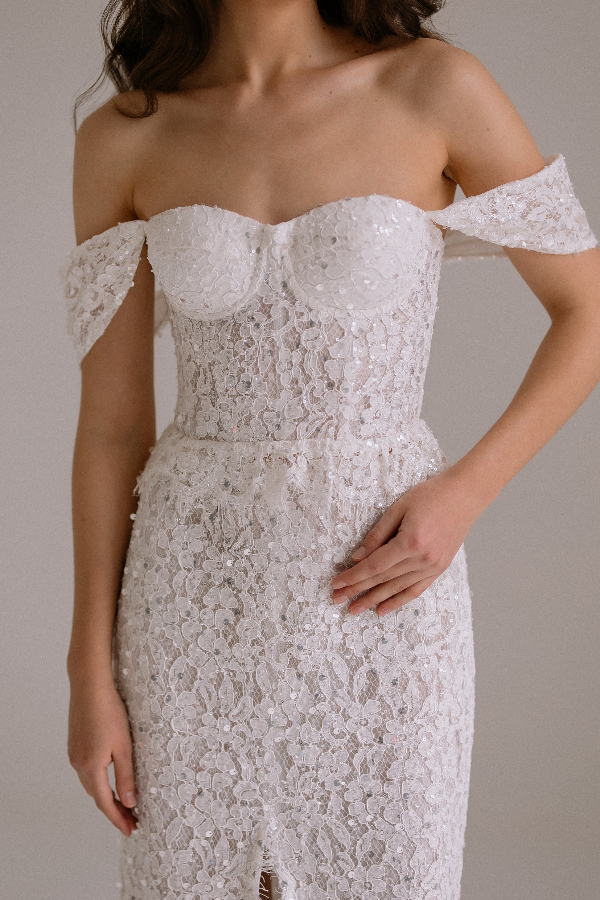Alessia top detail showing romantic off-shoulder sleeve-straps and corset design
