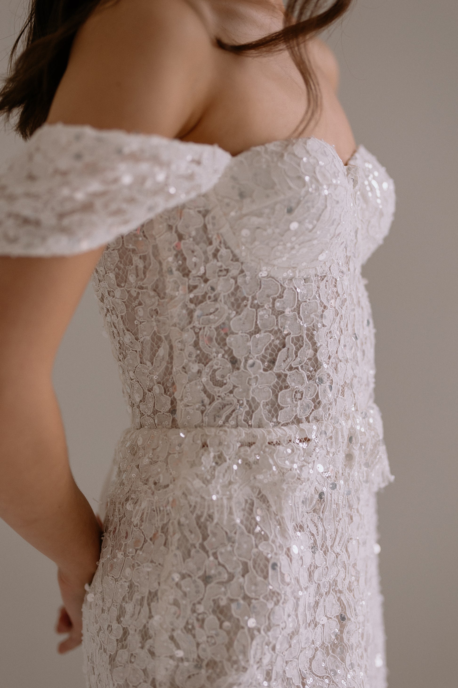 Alessia side top detail showing romantic off-shoulder sleeve-straps and corset design
