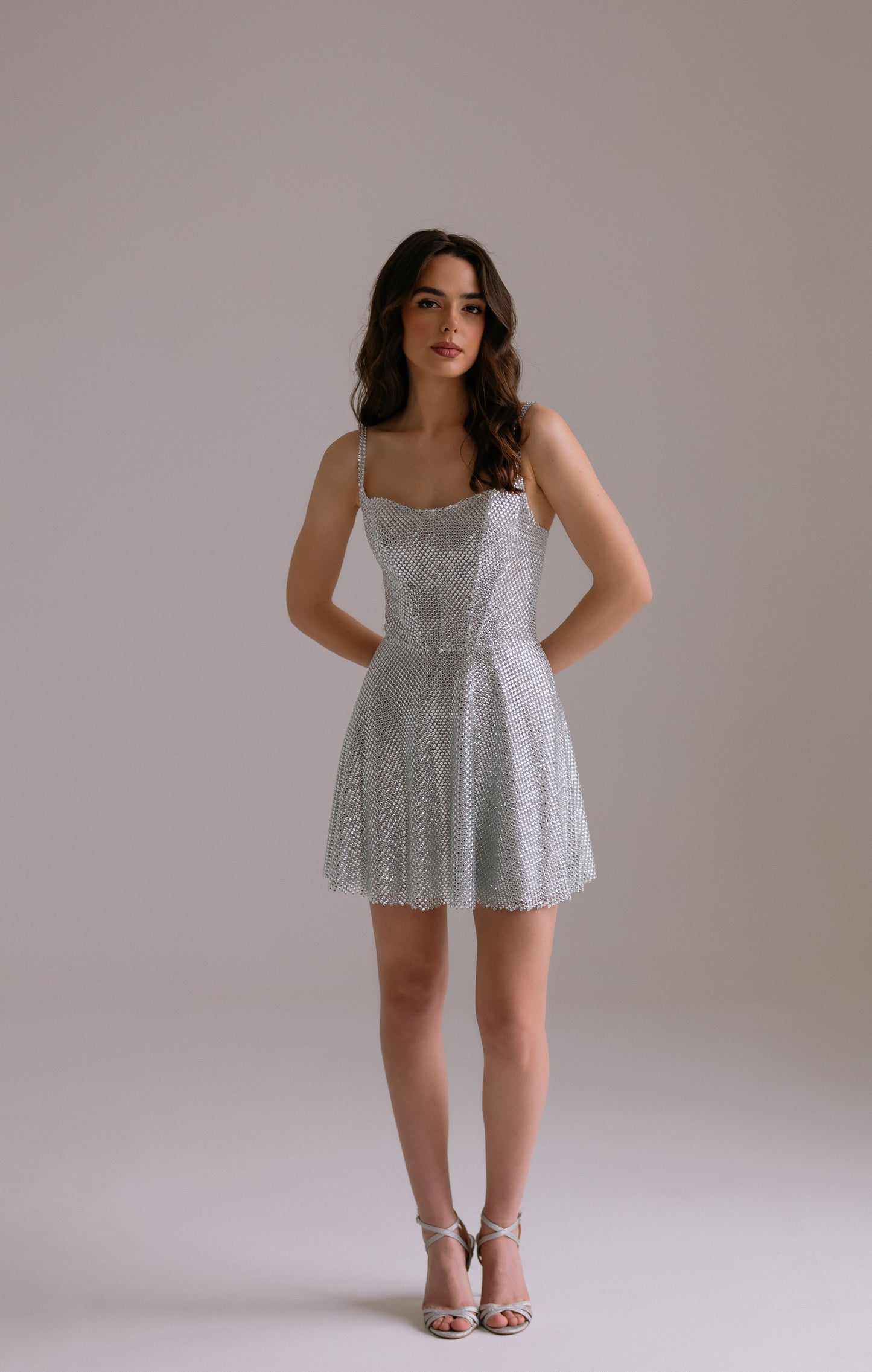 Aurora crystal embellished dress with structured top and A-line skirt perfect for bridal celebrations, full body view.
