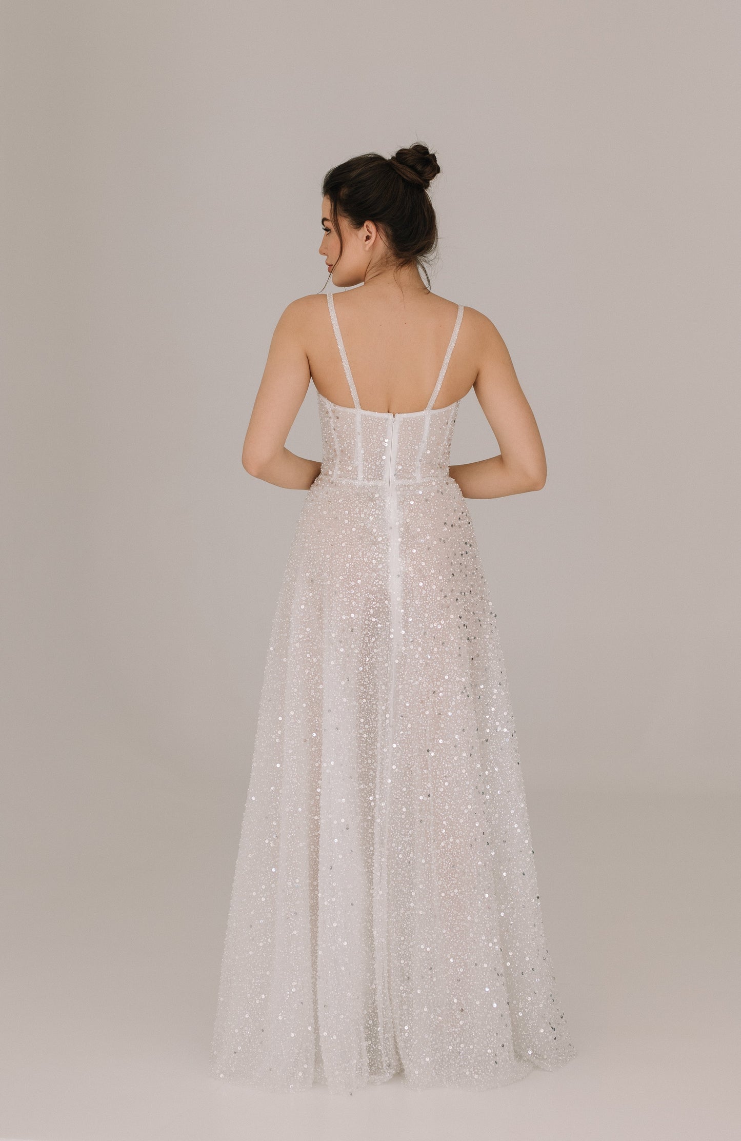 Celine dress back view showing sophisticated design with delicate straps and embellished fabric
