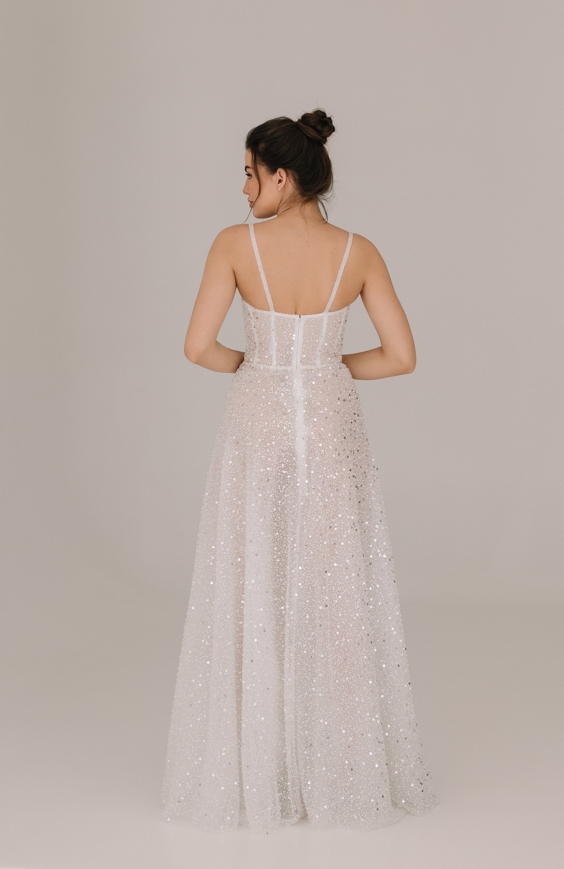 Celine dress back view showing sophisticated design with delicate straps and embellished fabric
